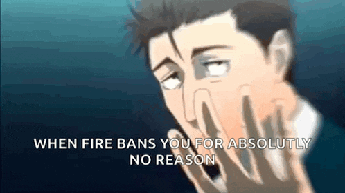 a man covering his face with his hands with the words when fire bans you for absolutely no reason below him