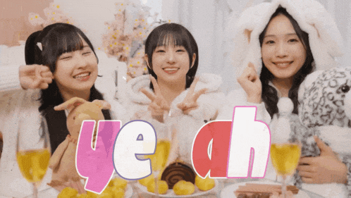 three girls are posing for a picture and the word yeah is on the bottom