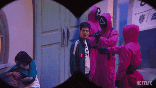 a netflix advertisement shows a group of people in pink jackets
