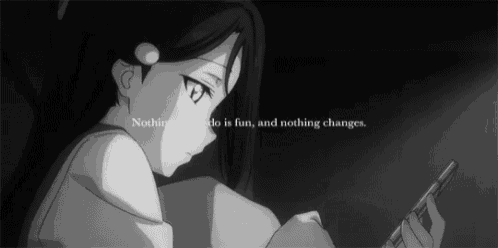 a black and white image of a girl holding a cell phone with the words nothing that i do is fun