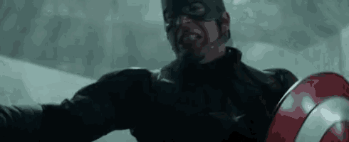 a close up of captain america holding a red and white shield