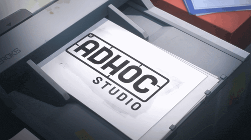 a piece of paper that says adhoc studio