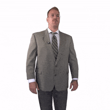 a man in a suit and tie has a button on his jacket that says ' i 'm a democrat '
