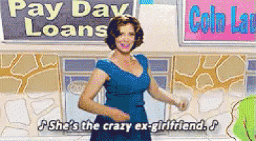 a woman in a blue dress is dancing in front of a pay day loan sign