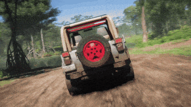 a jeep is driving down a dirt road and has a license plate that says aa510m