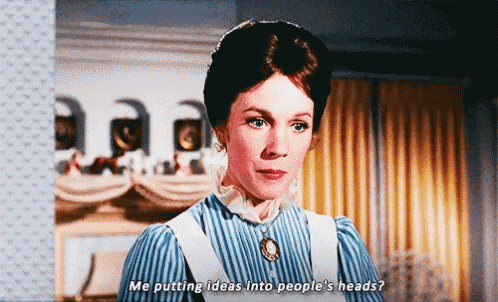 a woman in a blue and white striped dress is saying me putting ideas into people 's heads