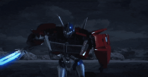 a robot is shooting a blue light at another robot