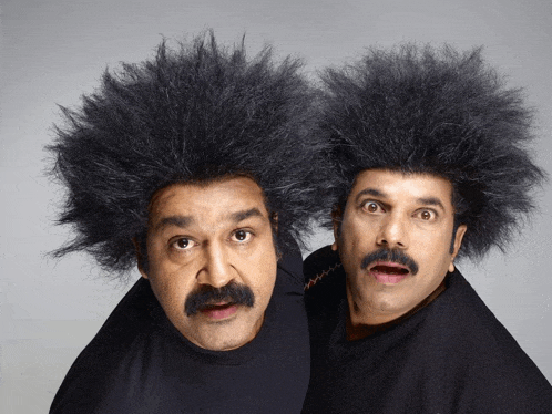 two men wearing wigs and mustaches are making funny faces