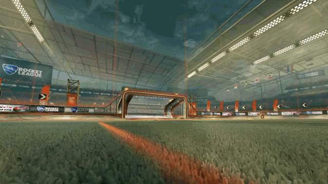 a rocket league game is being played in a large stadium
