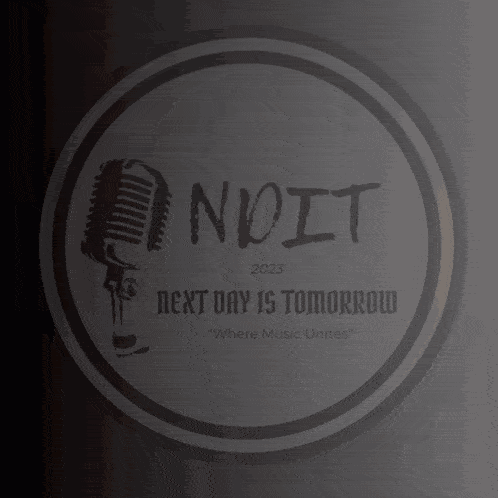 a cartoon of a man with glasses and a microphone in a circle that says next to tomorrow