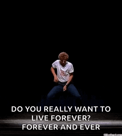 a man is dancing on a stage with the words `` do you really want to live forever ? forever and ever '' written below him .