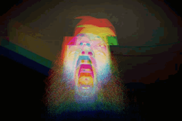 a colorful painting of a man with a beard