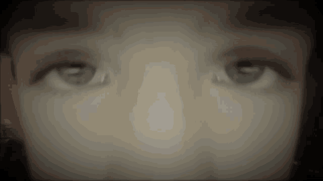a close up of a person 's eyes with the letters r and s visible
