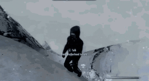a person is standing on top of a snow covered mountain talking to a dark brotherhood initiate