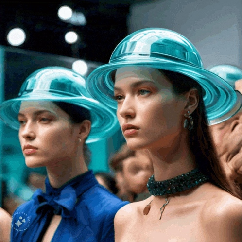 a woman wearing a blue hat has a sticker on her chest that says ' sydney ' on it
