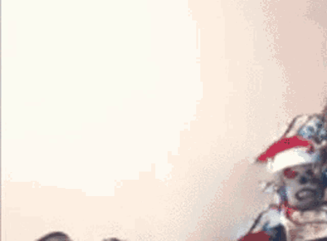 a man wearing headphones and a santa hat