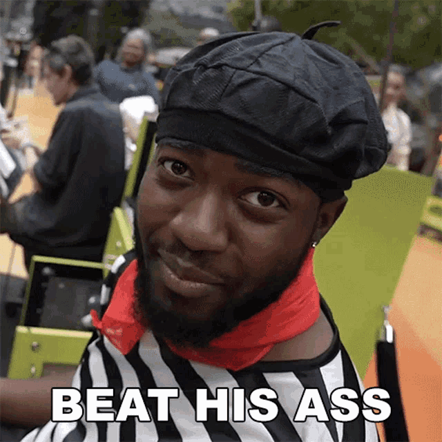 a man with a beard wearing a striped shirt and a hat says beat his ass