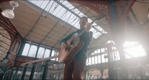 Strumming Acoustic GIF - Strumming Acoustic Guitarist GIFs