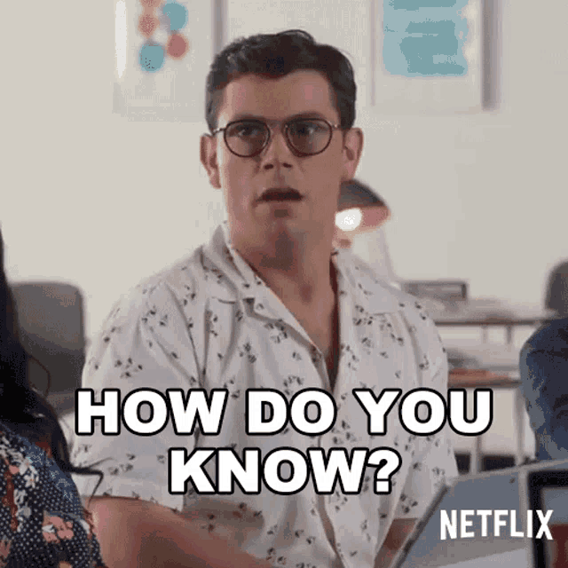 a man wearing glasses is sitting in front of a laptop computer and asking how do you know ?