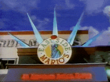 a building with a sign that says east side mario 's on it