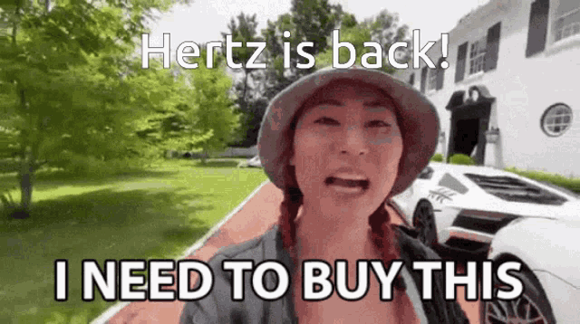 a woman wearing a hat is standing in front of a white car and says " hertz is back "