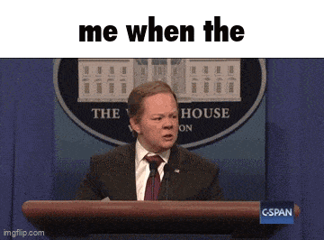 a man in a suit and tie is giving a speech in front of a white house sign