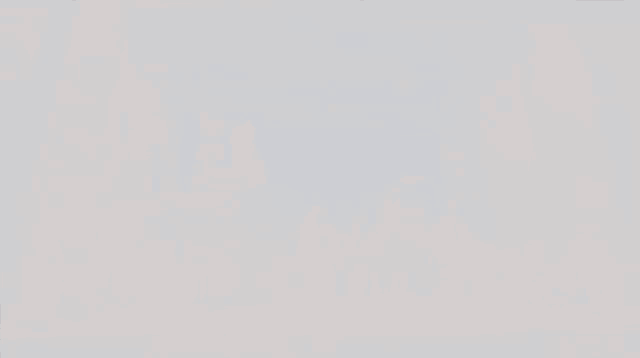 a pixelated image of a person with a feathered headpiece