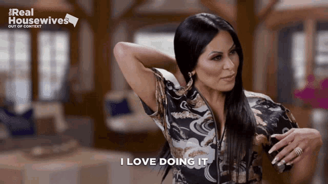 a woman says " i love doing it " in front of a real housewives logo
