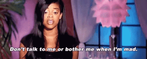 a woman is talking to someone and says `` don 't talk to me or bother me when i 'm mad ''