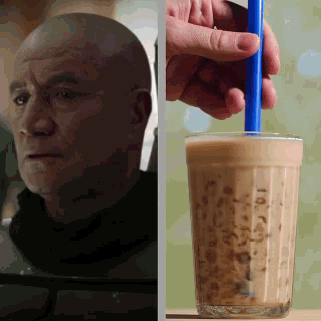 a man is holding a blue straw next to a glass of iced coffee
