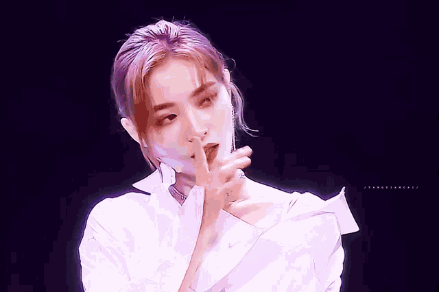 a woman with purple hair is wearing a white shirt with a collar