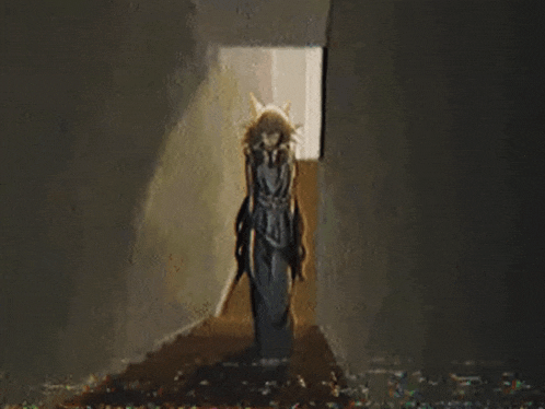 a statue of liberty is standing in a hallway .