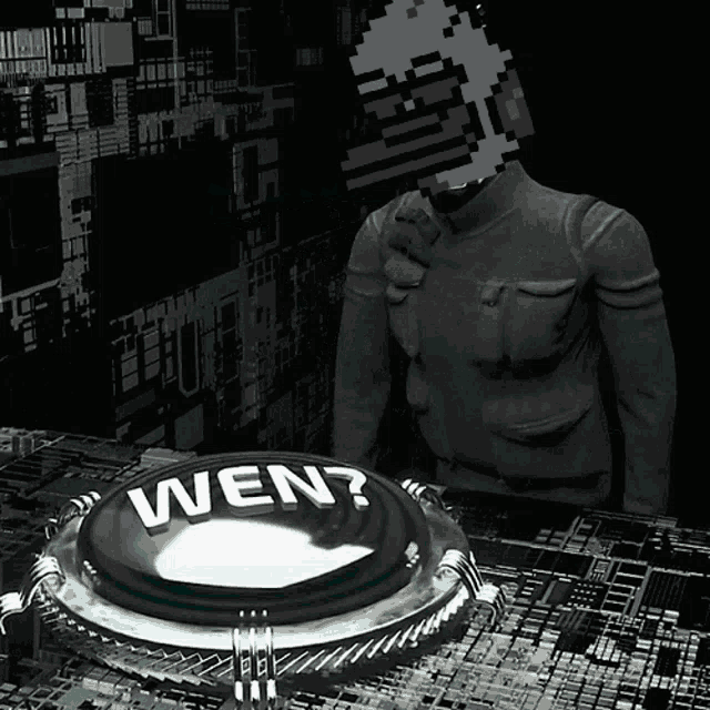 a black and white photo of a button that says wen on it