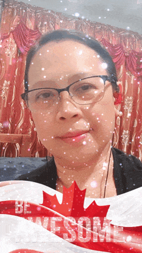 a woman with glasses and a canadian flag with the words be awesome