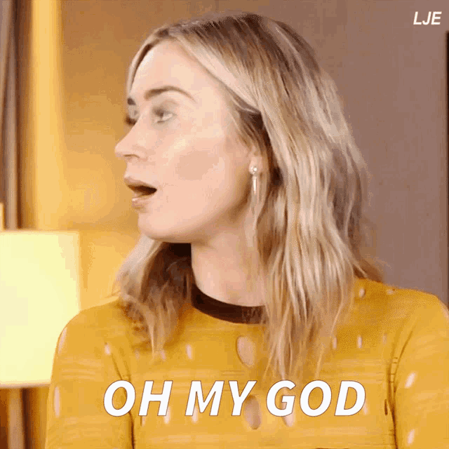 a woman in a yellow shirt says oh my god in white letters