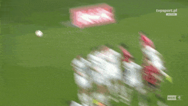 a tv screen shows a soccer game being played on tvpsport.pl