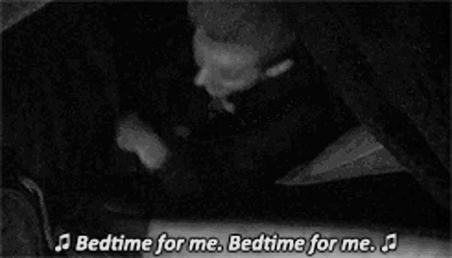 a black and white photo of a woman hugging a man with the words bedtime for me bedtime for me