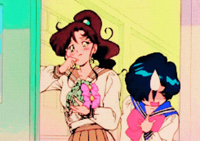 two anime girls are standing next to each other in a hallway