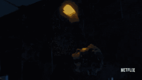 a dark room with netflix written on the bottom right