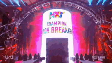 a stage with a sign that says champion ron breakker on it