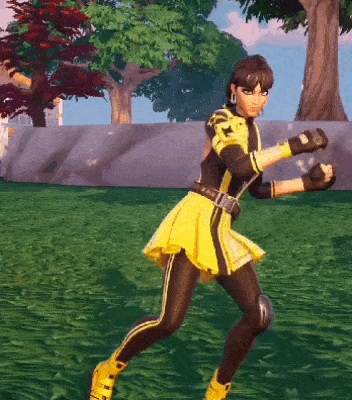 a woman in a yellow dress and black pants is standing in a grassy field .
