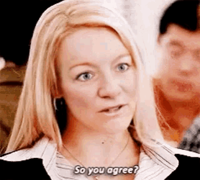a woman is talking to a man in a crowd and saying `` so you agree ? '' .