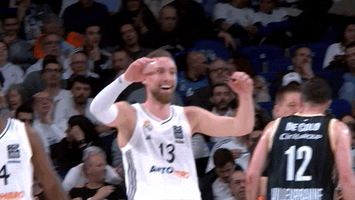 a basketball player with the number 12 on his jersey
