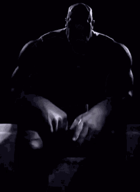 a black and white drawing of thanos with a beard .