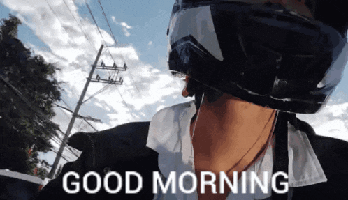 a man wearing a helmet says " good morning "