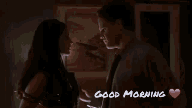 a man and a woman are standing next to each other and the words good morning are on the bottom