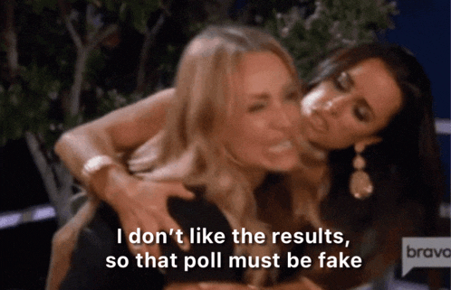 two women are hugging and one says i don t like the results so that poll must be fake