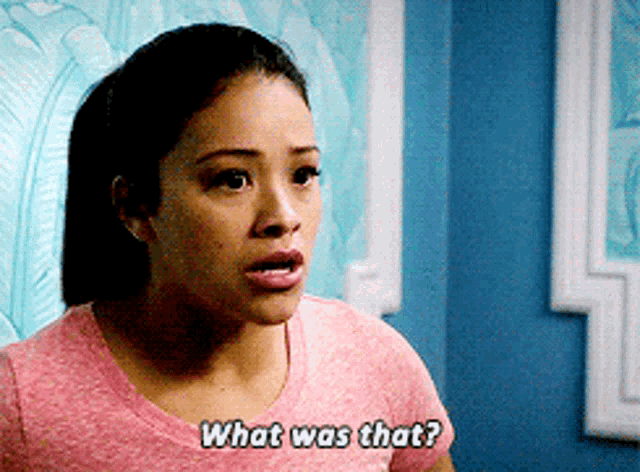 a woman in a pink shirt is asking " what was that "