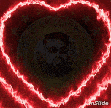 a picture of a man with a beard is surrounded by a red heart shaped flame