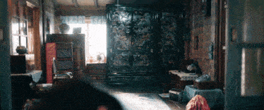 a room with a lot of furniture and a wardrobe